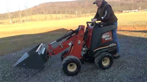 zahn mini skid steer|full size stand on skid steer.